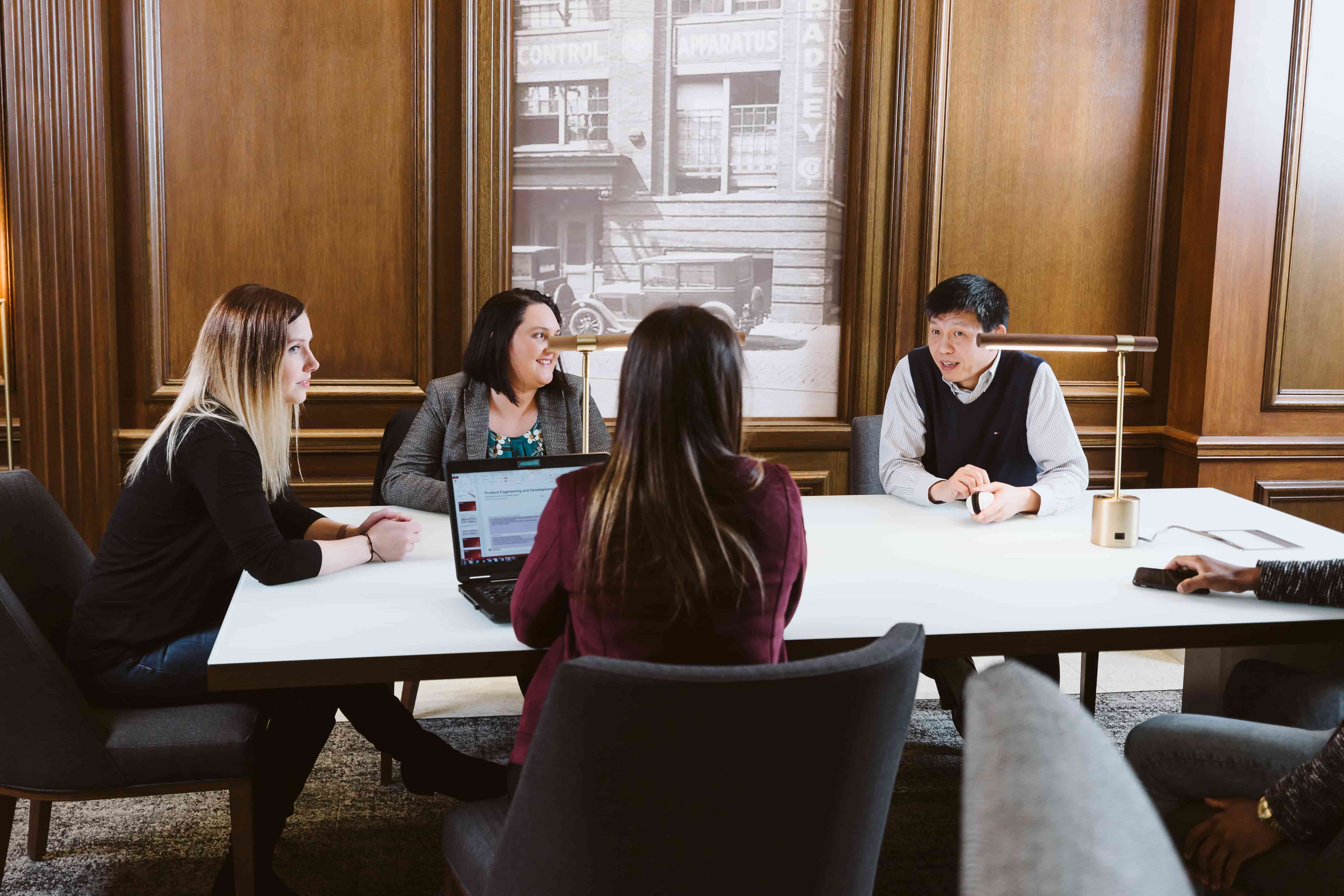 Rockwell team meeting in boardroom Rockwell team meeting in boardroom